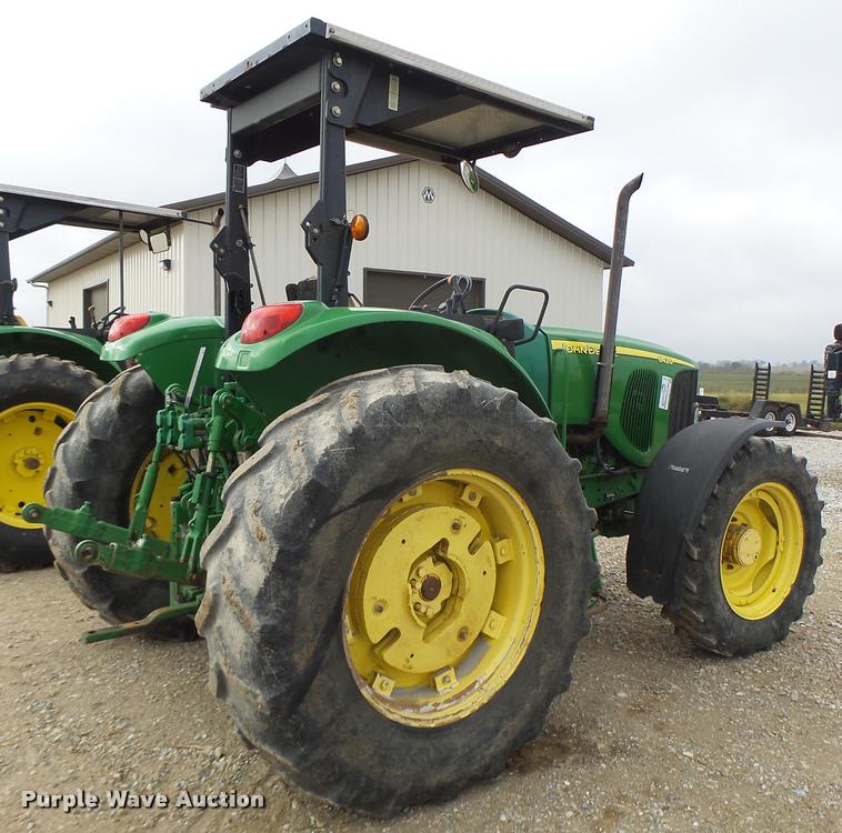 image for item K5596 2003 John Deere 6420 MFWD tractor