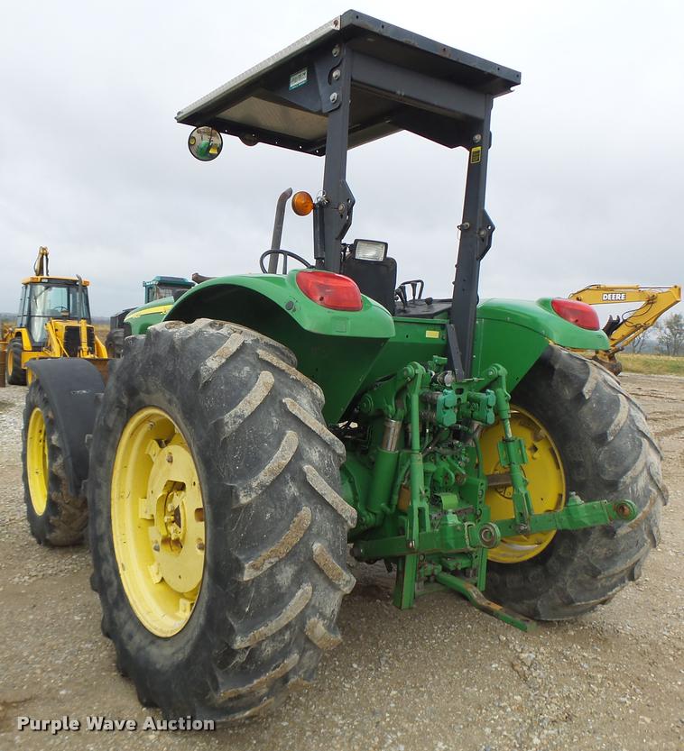 image for item K5596 2003 John Deere 6420 MFWD tractor