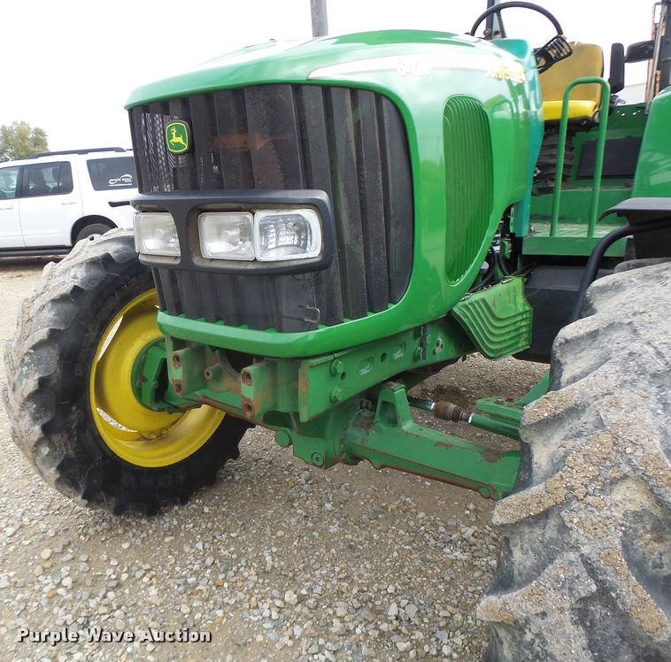 image for item K5596 2003 John Deere 6420 MFWD tractor