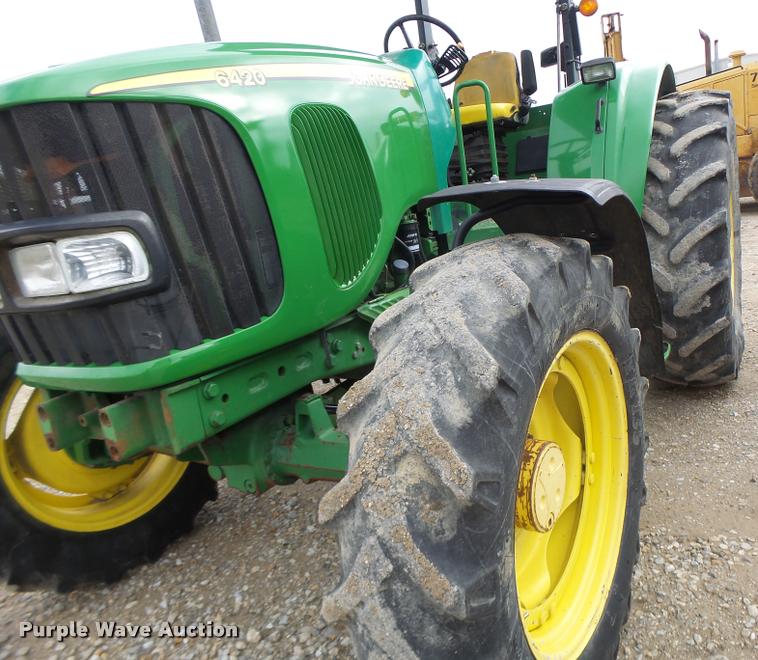 image for item K5596 2003 John Deere 6420 MFWD tractor