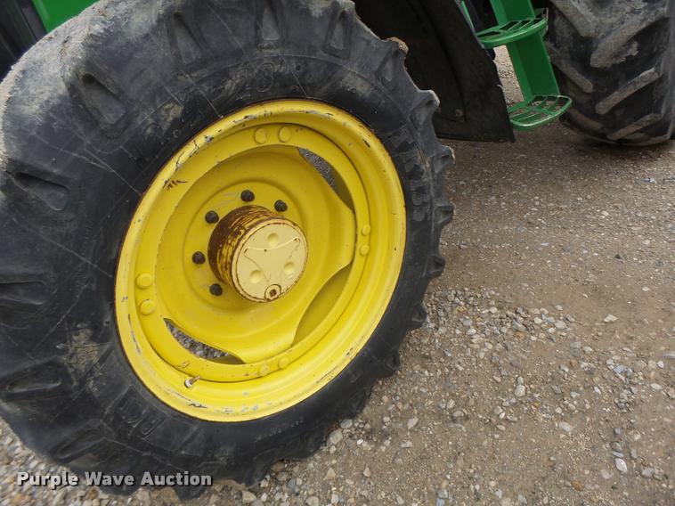 image for item K5596 2003 John Deere 6420 MFWD tractor