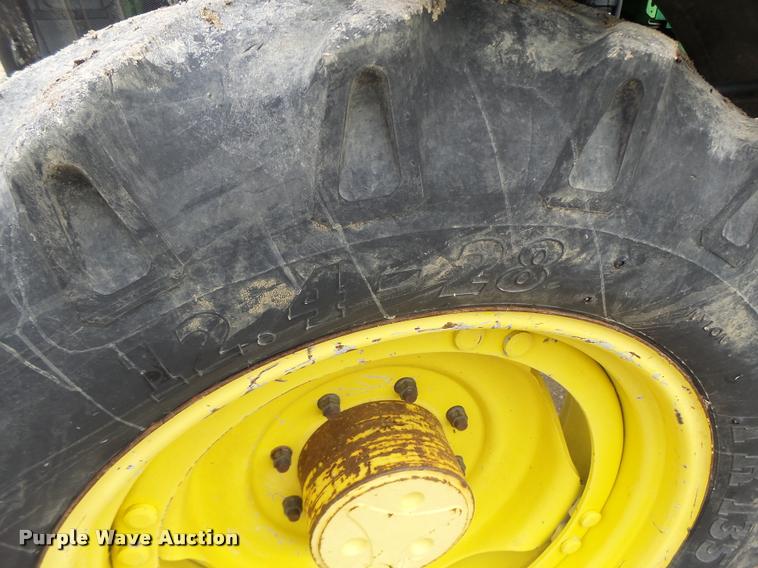 image for item K5596 2003 John Deere 6420 MFWD tractor