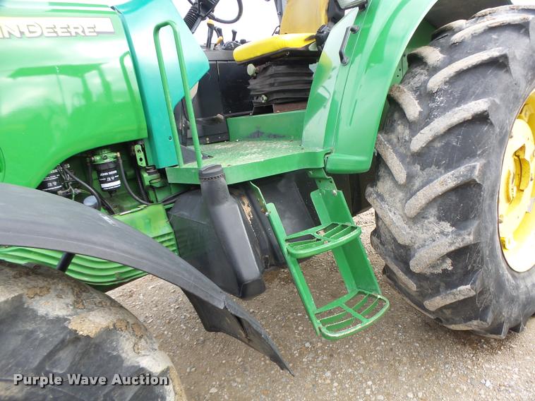 image for item K5596 2003 John Deere 6420 MFWD tractor