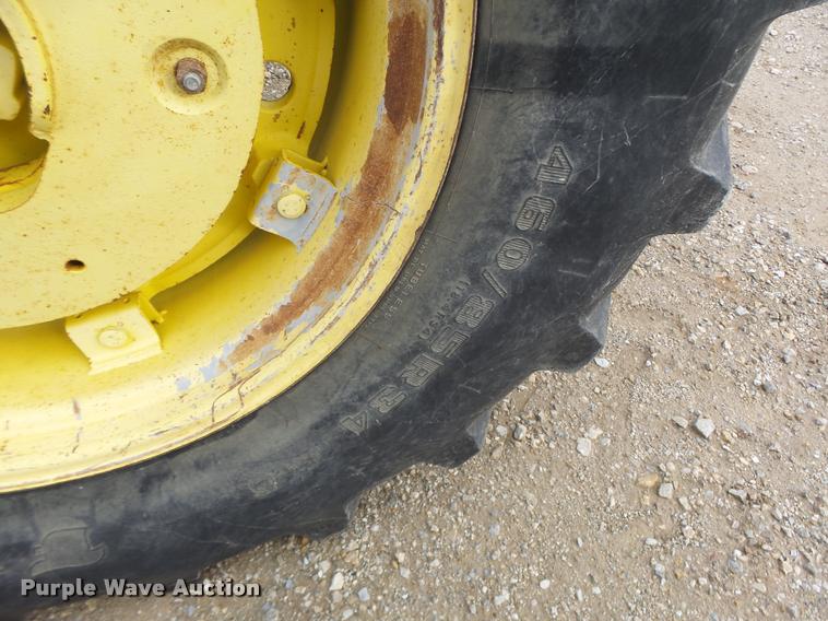 image for item K5596 2003 John Deere 6420 MFWD tractor