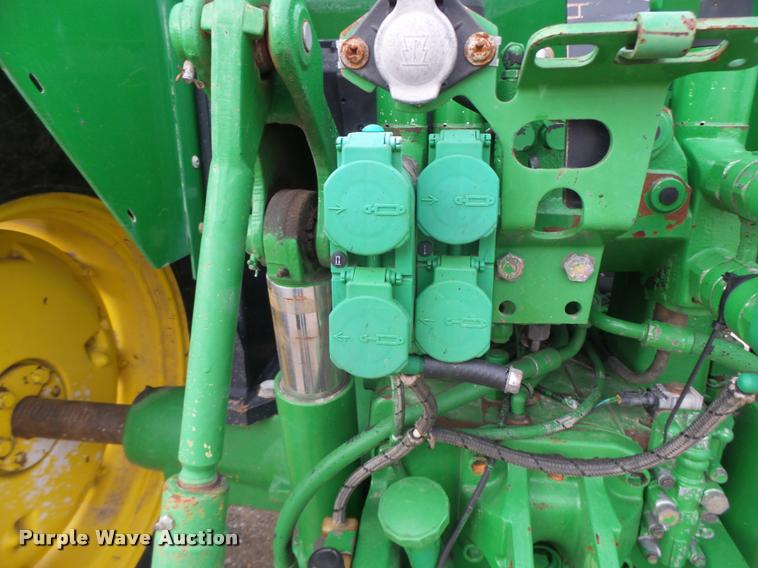 image for item K5596 2003 John Deere 6420 MFWD tractor