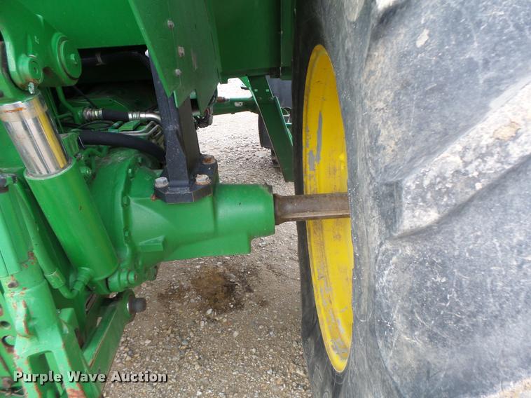 image for item K5596 2003 John Deere 6420 MFWD tractor