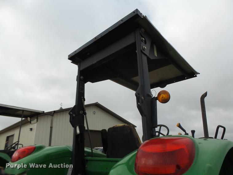 image for item K5596 2003 John Deere 6420 MFWD tractor