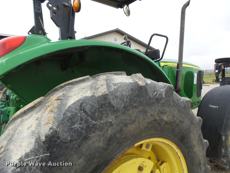 image for item K5596 2003 John Deere 6420 MFWD tractor