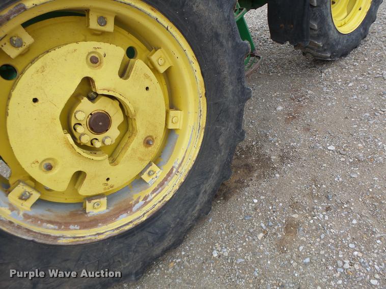 image for item K5596 2003 John Deere 6420 MFWD tractor