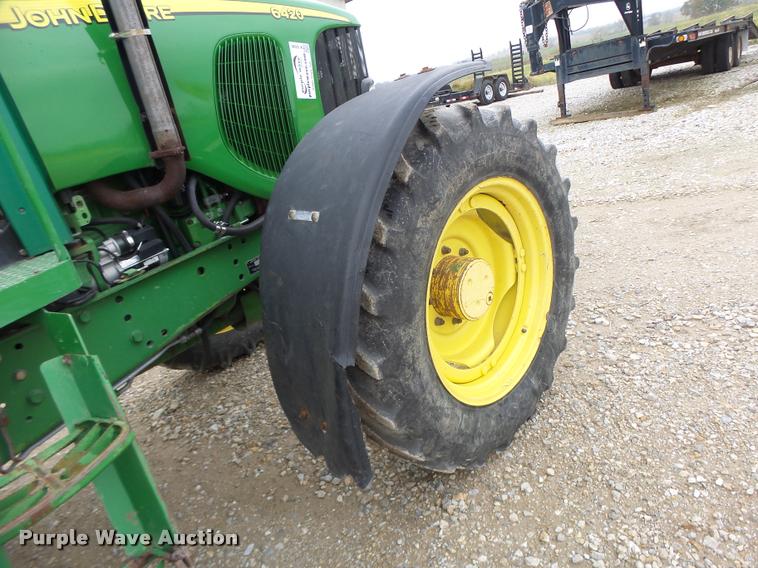 image for item K5596 2003 John Deere 6420 MFWD tractor