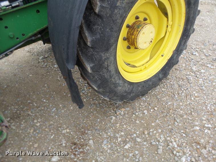 image for item K5596 2003 John Deere 6420 MFWD tractor