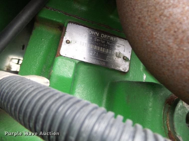 image for item K5596 2003 John Deere 6420 MFWD tractor