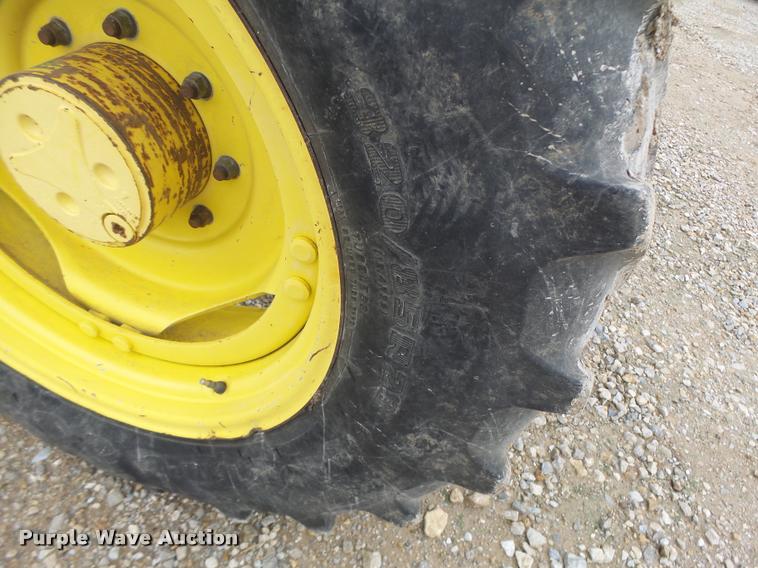 image for item K5596 2003 John Deere 6420 MFWD tractor