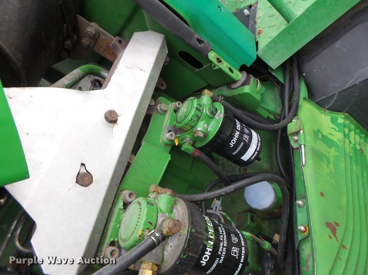 image for item K5596 2003 John Deere 6420 MFWD tractor