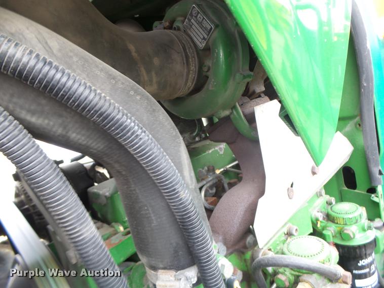 image for item K5596 2003 John Deere 6420 MFWD tractor