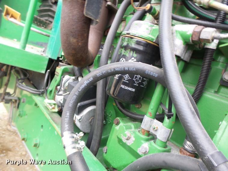 image for item K5596 2003 John Deere 6420 MFWD tractor