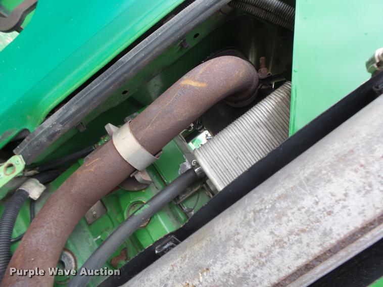 image for item K5596 2003 John Deere 6420 MFWD tractor