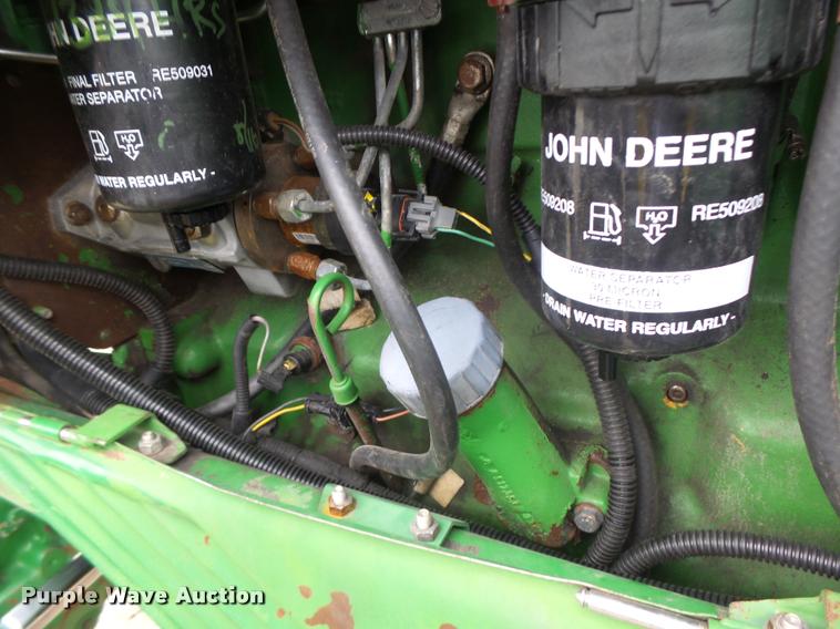 image for item K5596 2003 John Deere 6420 MFWD tractor