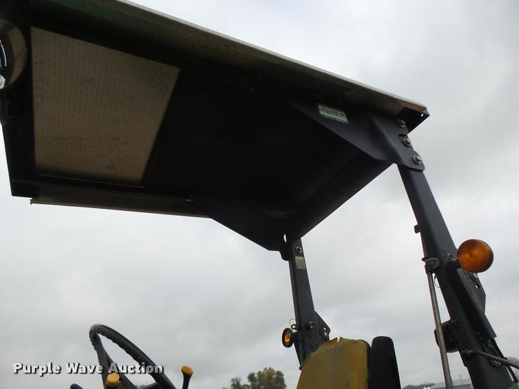 image for item K5596 2003 John Deere 6420 MFWD tractor