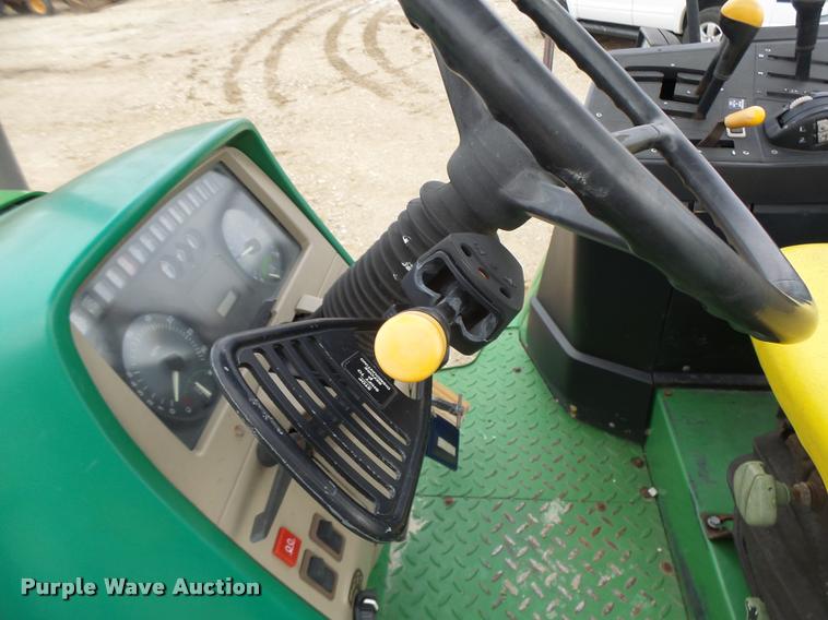 image for item K5596 2003 John Deere 6420 MFWD tractor