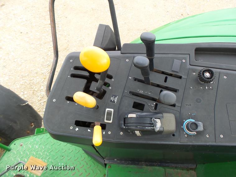 image for item K5596 2003 John Deere 6420 MFWD tractor