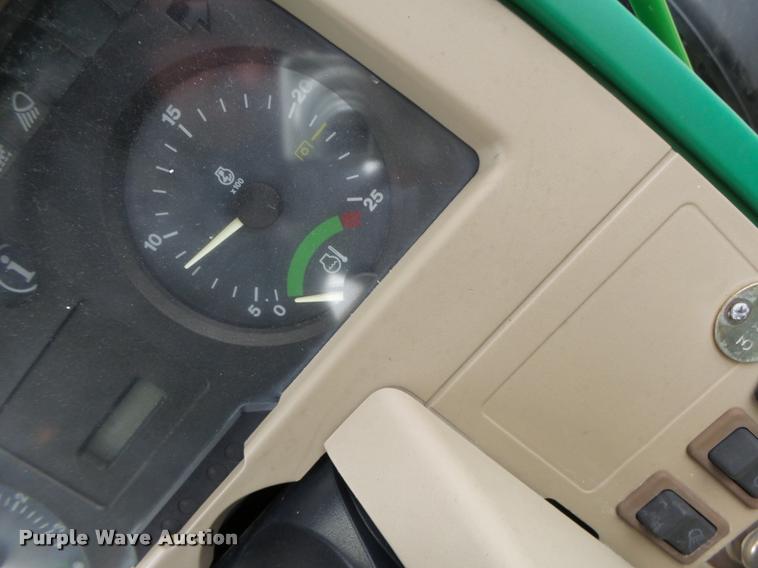 image for item K5596 2003 John Deere 6420 MFWD tractor
