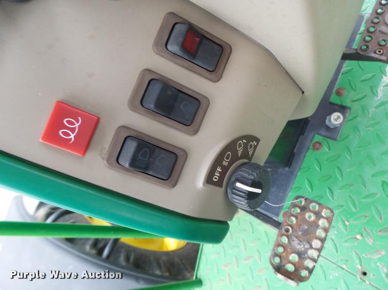 image for item K5596 2003 John Deere 6420 MFWD tractor