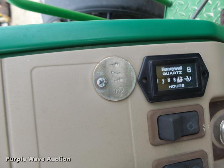 image for item K5596 2003 John Deere 6420 MFWD tractor