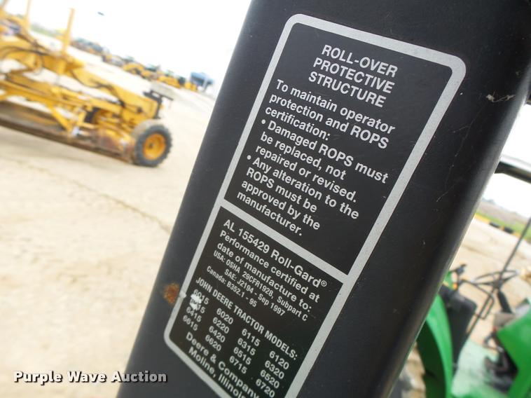 image for item K5596 2003 John Deere 6420 MFWD tractor