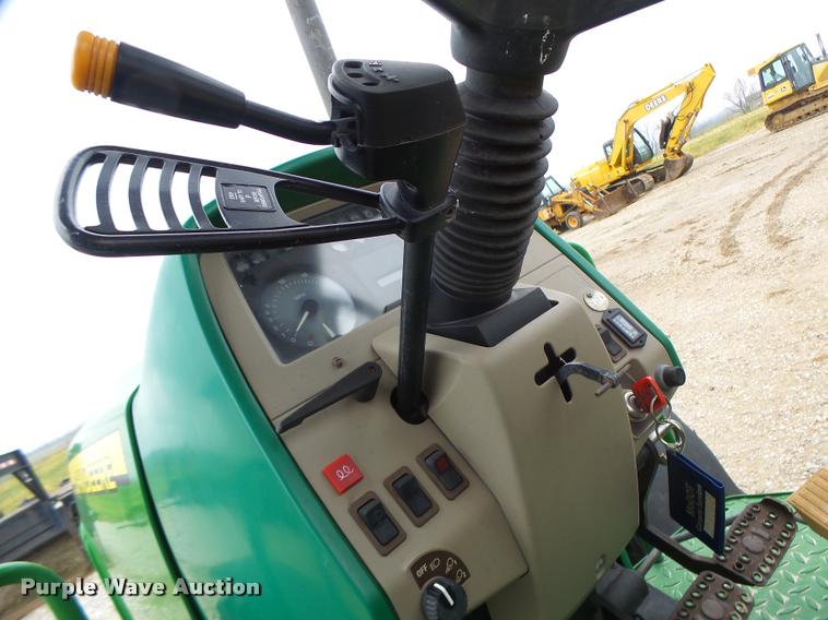 image for item K5596 2003 John Deere 6420 MFWD tractor