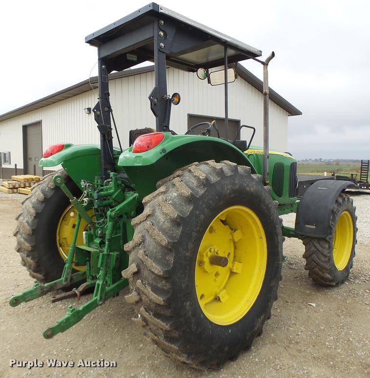 image for item K5597 2002 John Deere 6420 MFWD tractor