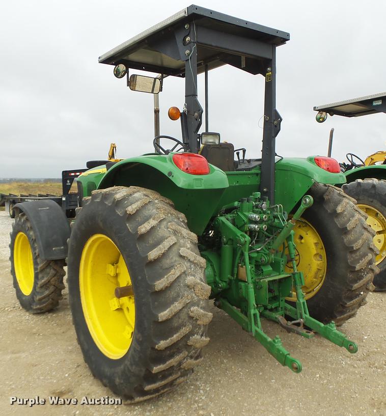 image for item K5597 2002 John Deere 6420 MFWD tractor