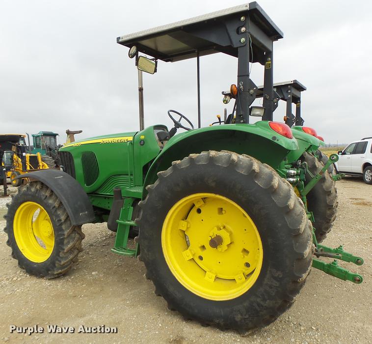 image for item K5597 2002 John Deere 6420 MFWD tractor