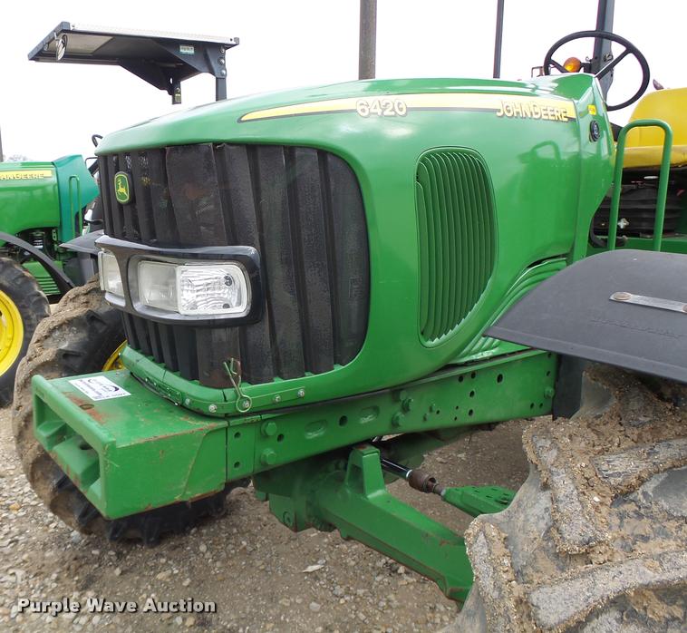 image for item K5597 2002 John Deere 6420 MFWD tractor