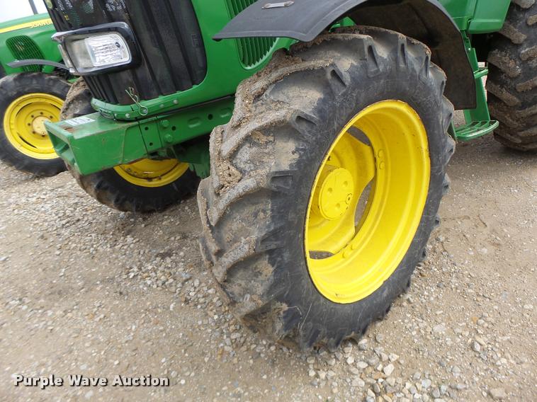 image for item K5597 2002 John Deere 6420 MFWD tractor