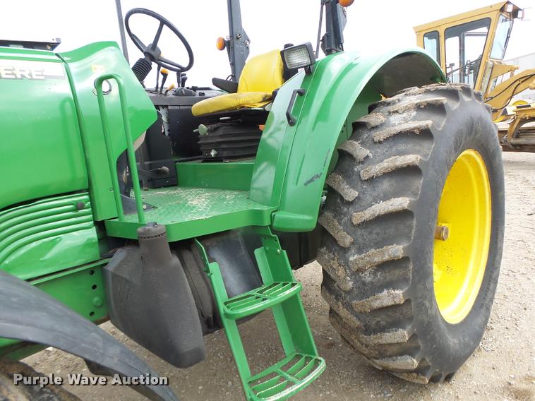 image for item K5597 2002 John Deere 6420 MFWD tractor