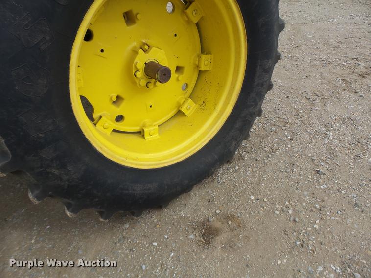 image for item K5597 2002 John Deere 6420 MFWD tractor