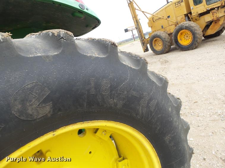 image for item K5597 2002 John Deere 6420 MFWD tractor