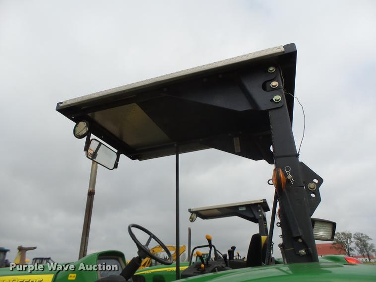 image for item K5597 2002 John Deere 6420 MFWD tractor