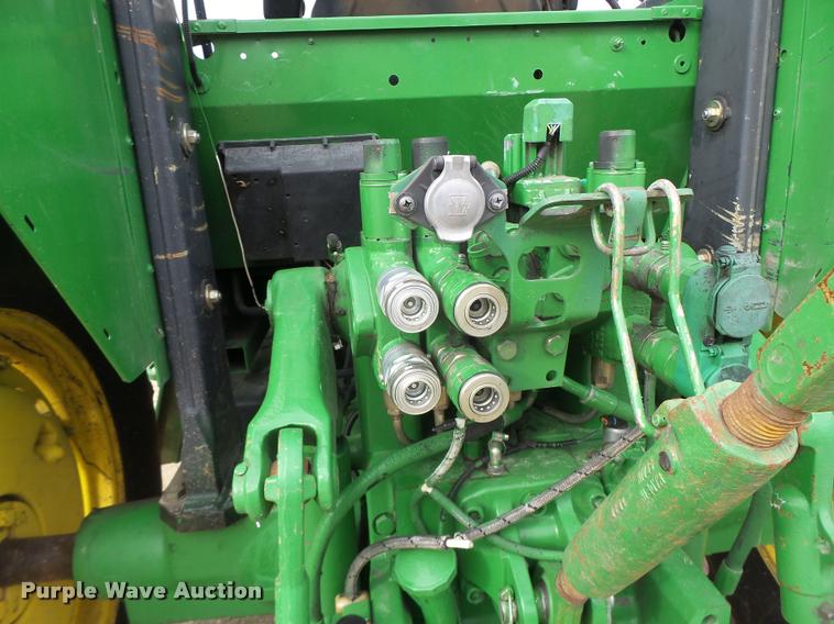 image for item K5597 2002 John Deere 6420 MFWD tractor