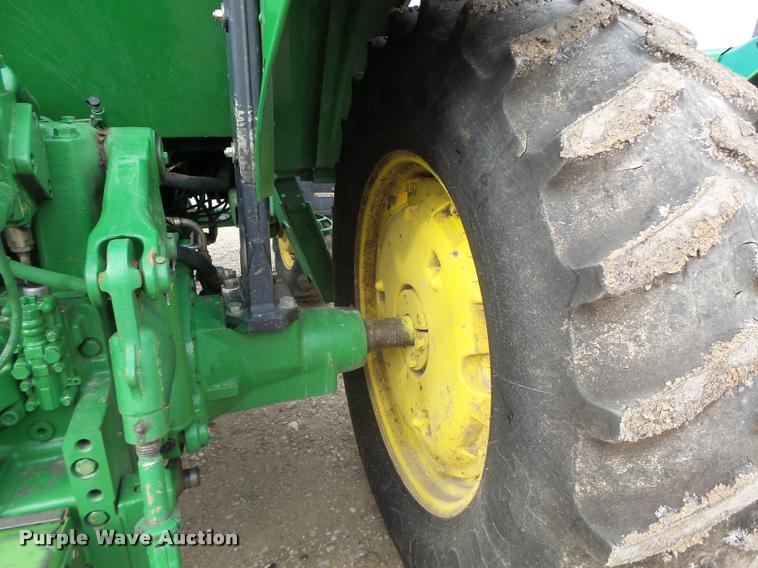 image for item K5597 2002 John Deere 6420 MFWD tractor