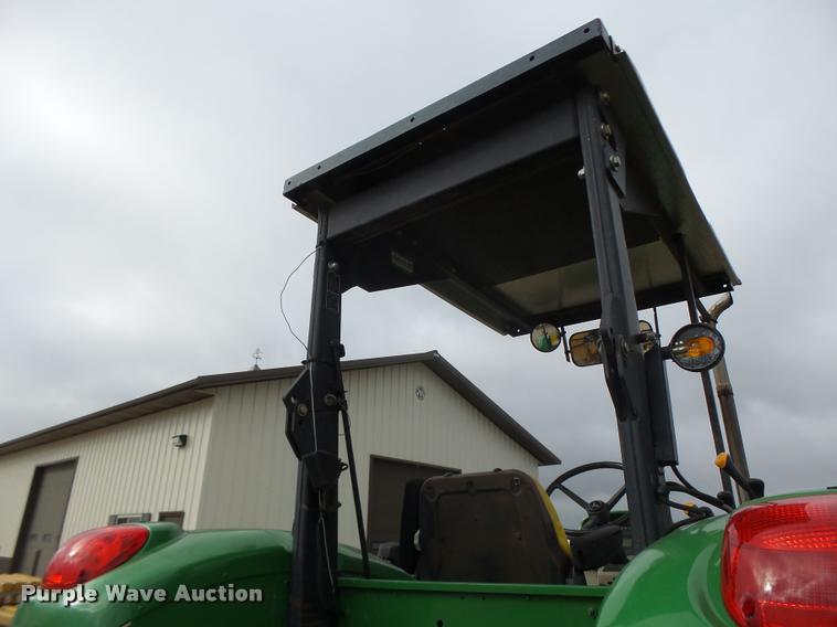 image for item K5597 2002 John Deere 6420 MFWD tractor