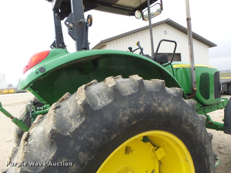 image for item K5597 2002 John Deere 6420 MFWD tractor