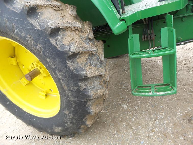 image for item K5597 2002 John Deere 6420 MFWD tractor