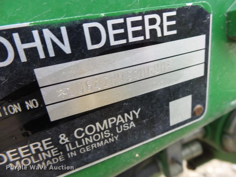 image for item K5597 2002 John Deere 6420 MFWD tractor