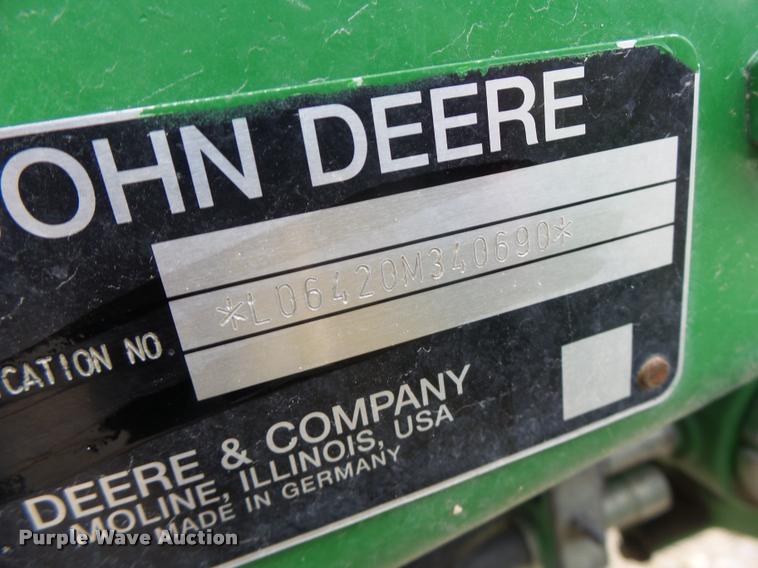 image for item K5597 2002 John Deere 6420 MFWD tractor