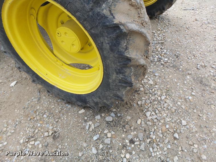 image for item K5597 2002 John Deere 6420 MFWD tractor