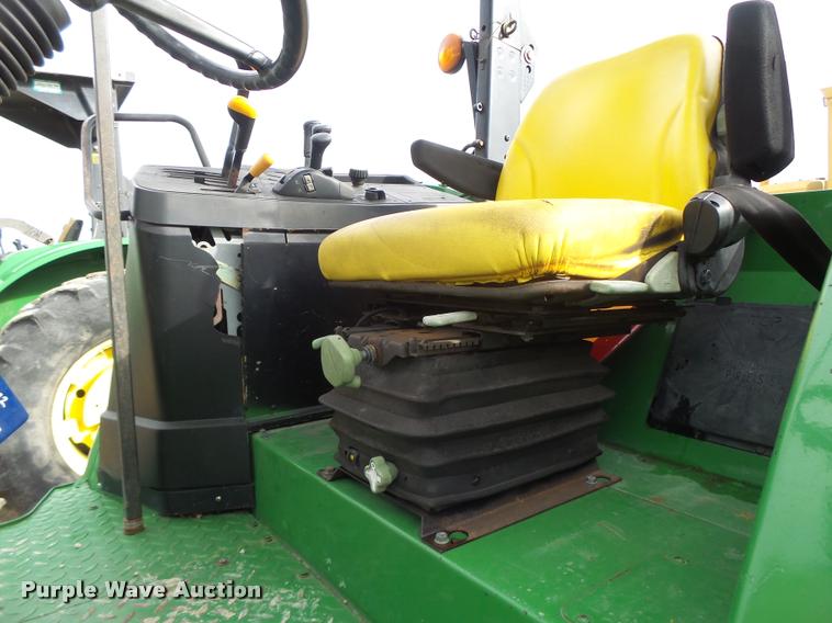 image for item K5597 2002 John Deere 6420 MFWD tractor