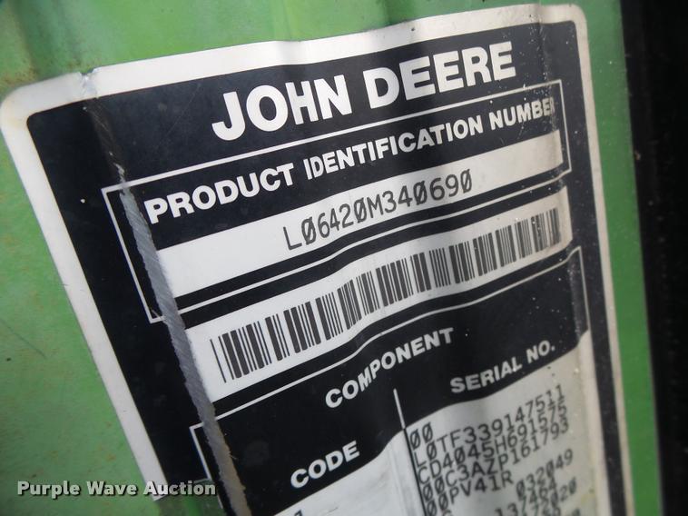 image for item K5597 2002 John Deere 6420 MFWD tractor