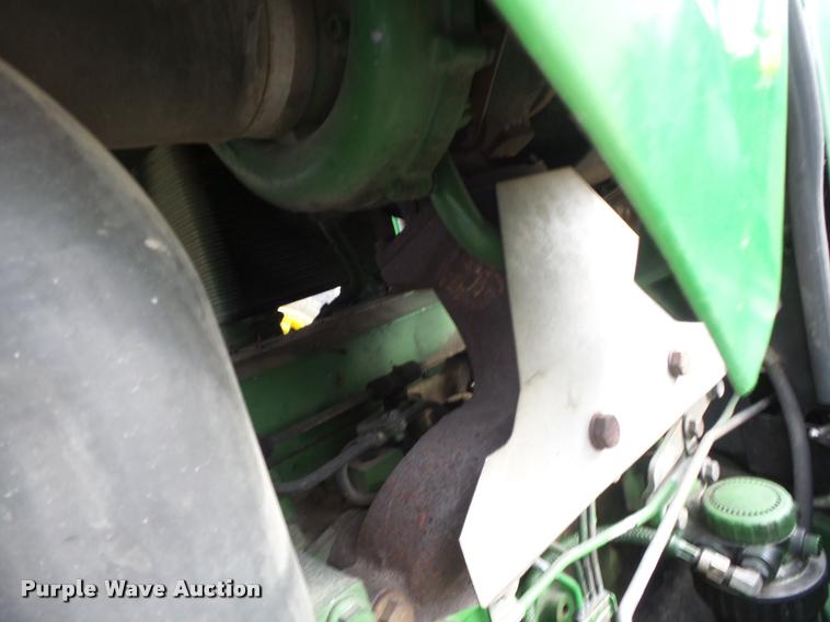 image for item K5597 2002 John Deere 6420 MFWD tractor